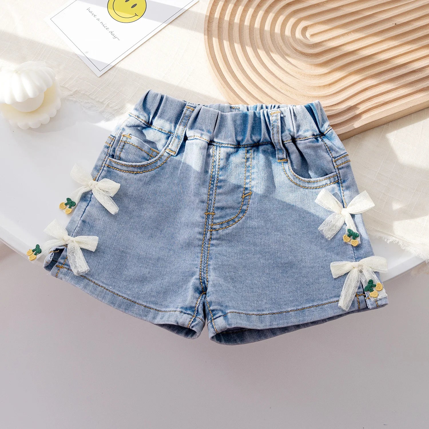 Shorts Infantil Feminino Jeans Lacinhos